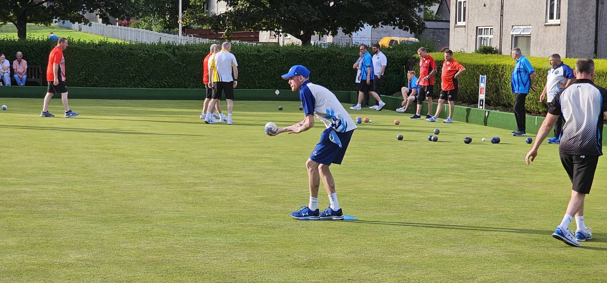 Aaron Furzer preparing to deliver his bowl with focused precision during the Gents Singles final